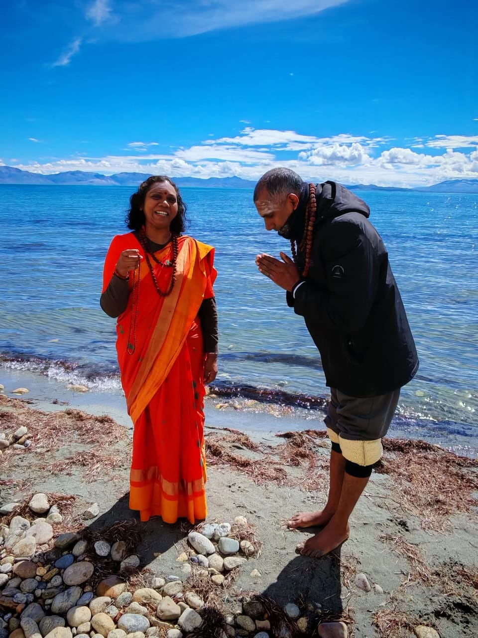 Happy client with Guru Pandey at Mansarovar Lake