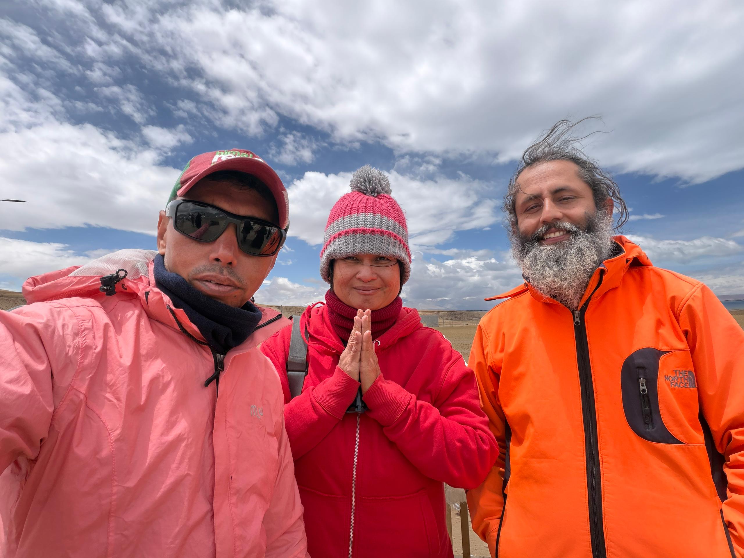 Pilgrims greeting with folded hands at the shore of Mansarovar Lake